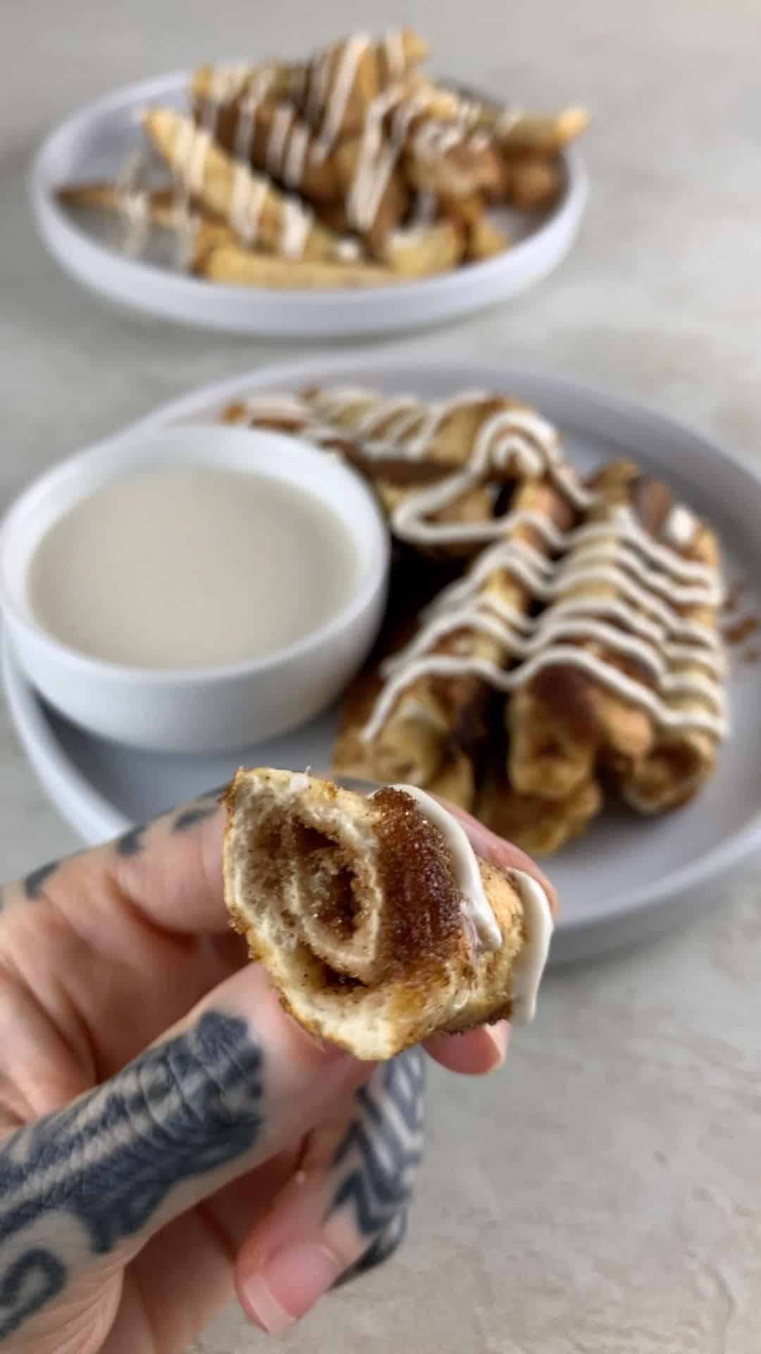 Rolled cinnamon-sugar French toast sticks with icing drizzle (high-protein)