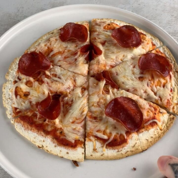 high-protein double-stuffed tortilla pizza, sliced into wedges