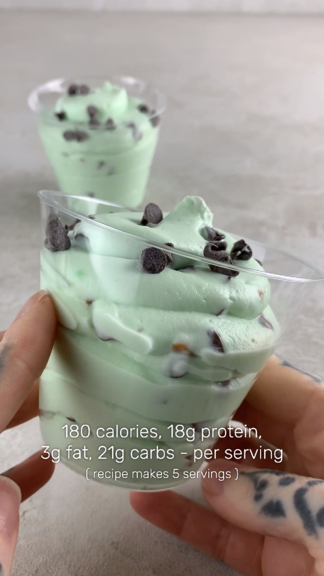 high-protein fluffy yogurt with pistachios and chocolate chips in a bowl